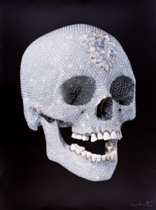 In this exhibition, Hirst continued to explore the fundamental themes of human existence – life, death, truth, love, immortality and art itself. For the Love of God is a life-size cast of a human skull in platinum. 